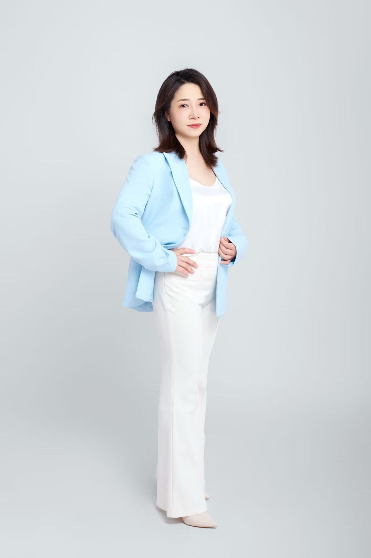 Becky Wang standing portrait for A Plus Finance
